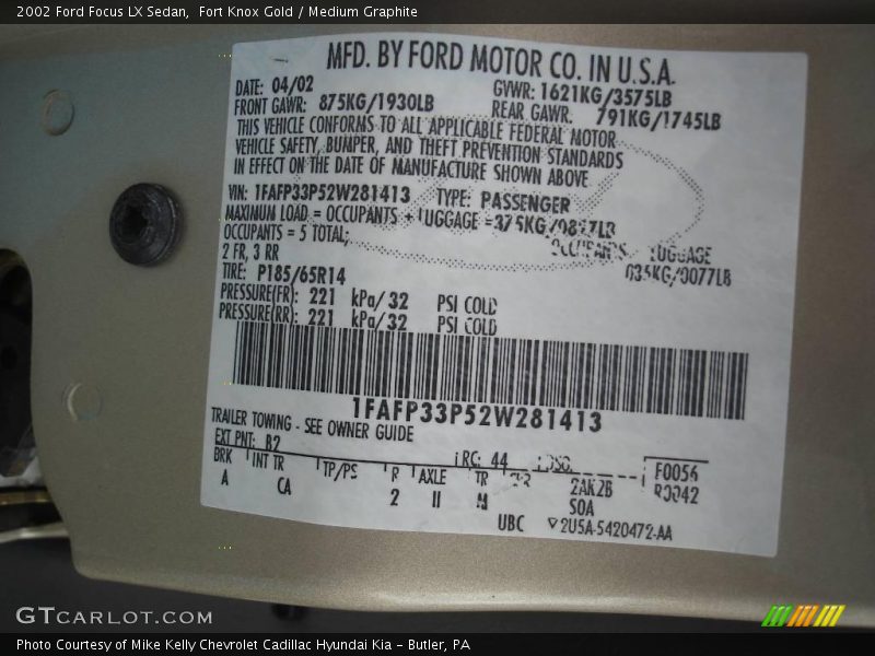 Fort Knox Gold / Medium Graphite 2002 Ford Focus LX Sedan
