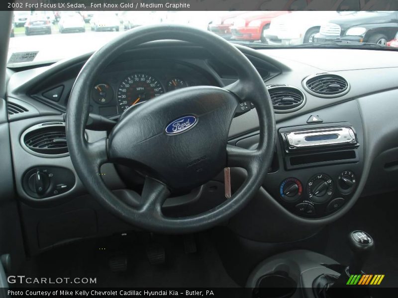 Fort Knox Gold / Medium Graphite 2002 Ford Focus LX Sedan