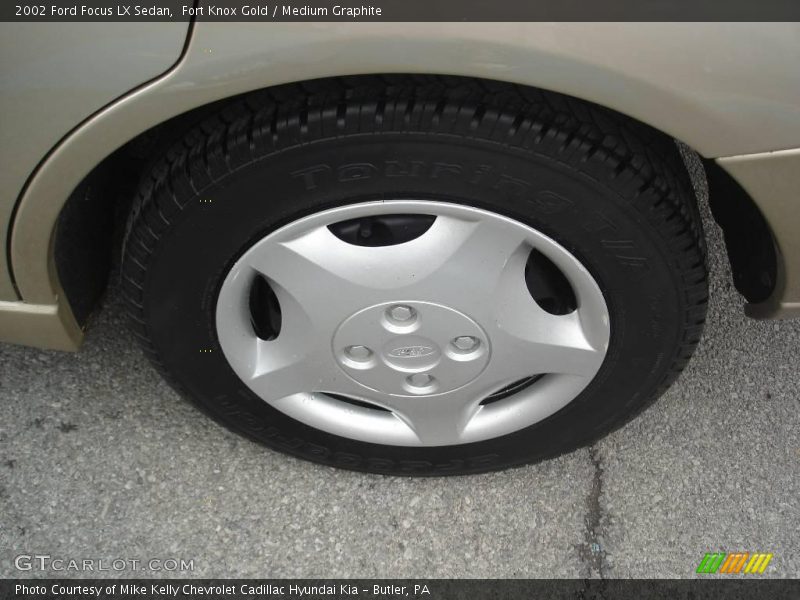 Fort Knox Gold / Medium Graphite 2002 Ford Focus LX Sedan
