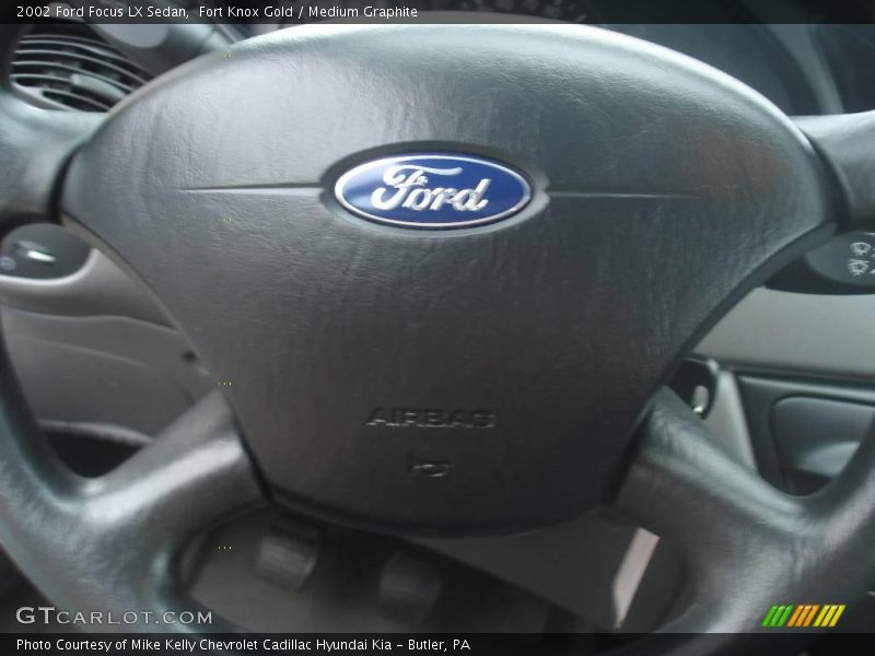 Fort Knox Gold / Medium Graphite 2002 Ford Focus LX Sedan