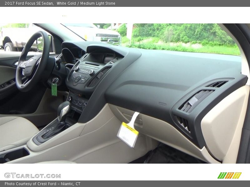 White Gold / Medium Light Stone 2017 Ford Focus SE Sedan