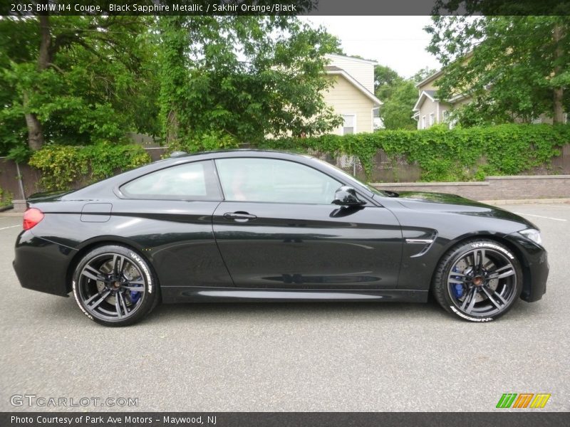 Black Sapphire Metallic / Sakhir Orange/Black 2015 BMW M4 Coupe