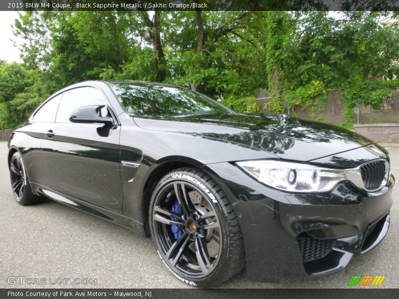 Black Sapphire Metallic / Sakhir Orange/Black 2015 BMW M4 Coupe