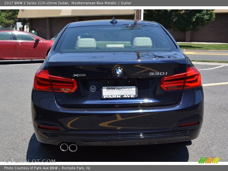 Mediterranean Blue Metallic / Oyster 2017 BMW 3 Series 320i xDrive Sedan