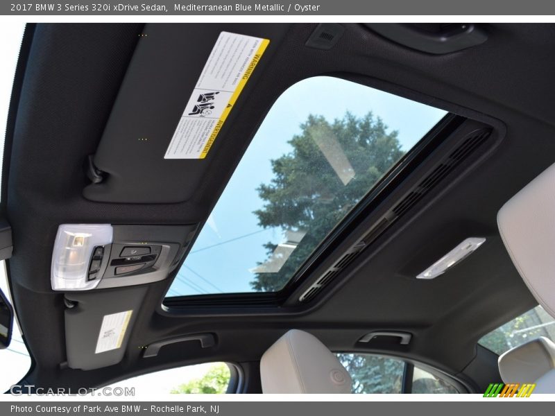 Mediterranean Blue Metallic / Oyster 2017 BMW 3 Series 320i xDrive Sedan