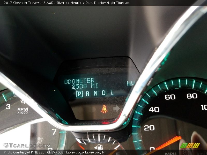 Silver Ice Metallic / Dark Titanium/Light Titanium 2017 Chevrolet Traverse LS AWD