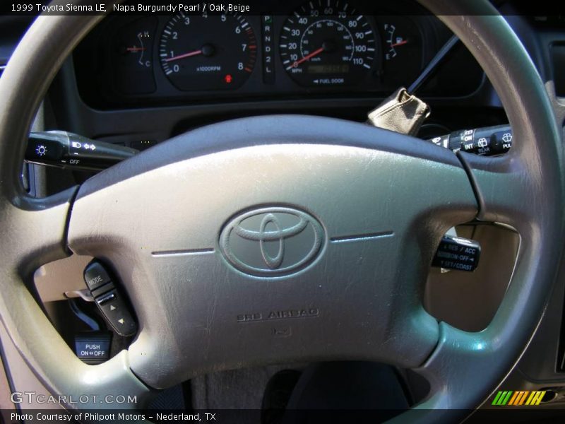 Napa Burgundy Pearl / Oak Beige 1999 Toyota Sienna LE