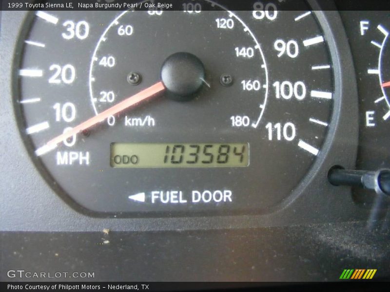 Napa Burgundy Pearl / Oak Beige 1999 Toyota Sienna LE