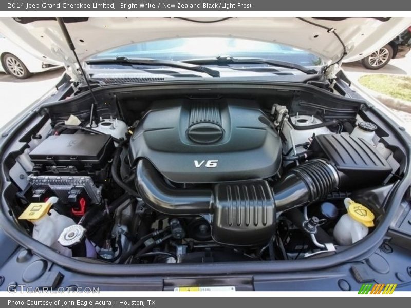 Bright White / New Zealand Black/Light Frost 2014 Jeep Grand Cherokee Limited