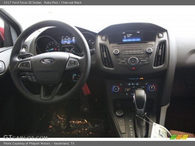 Ruby Red / Charcoal Black 2017 Ford Focus SE Sedan