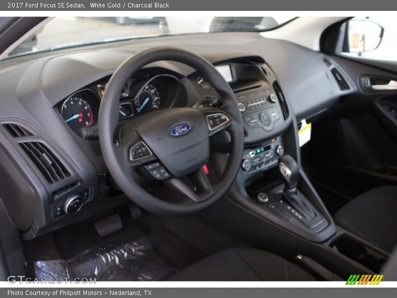 White Gold / Charcoal Black 2017 Ford Focus SE Sedan