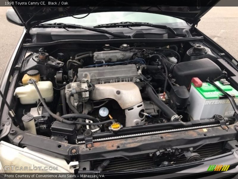 Black / Oak 1998 Toyota Camry CE