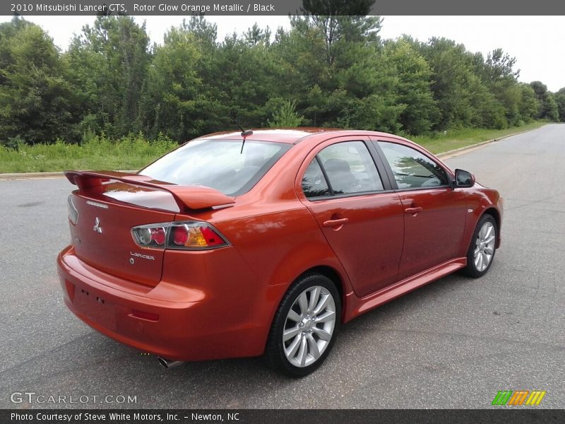 Rotor Glow Orange Metallic / Black 2010 Mitsubishi Lancer GTS