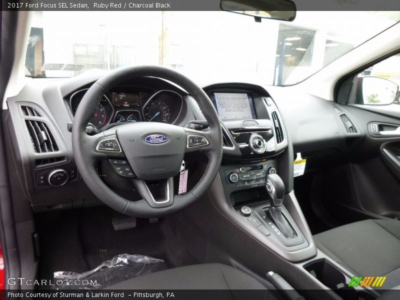 Ruby Red / Charcoal Black 2017 Ford Focus SEL Sedan