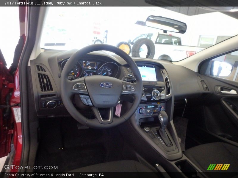 Ruby Red / Charcoal Black 2017 Ford Focus SEL Sedan