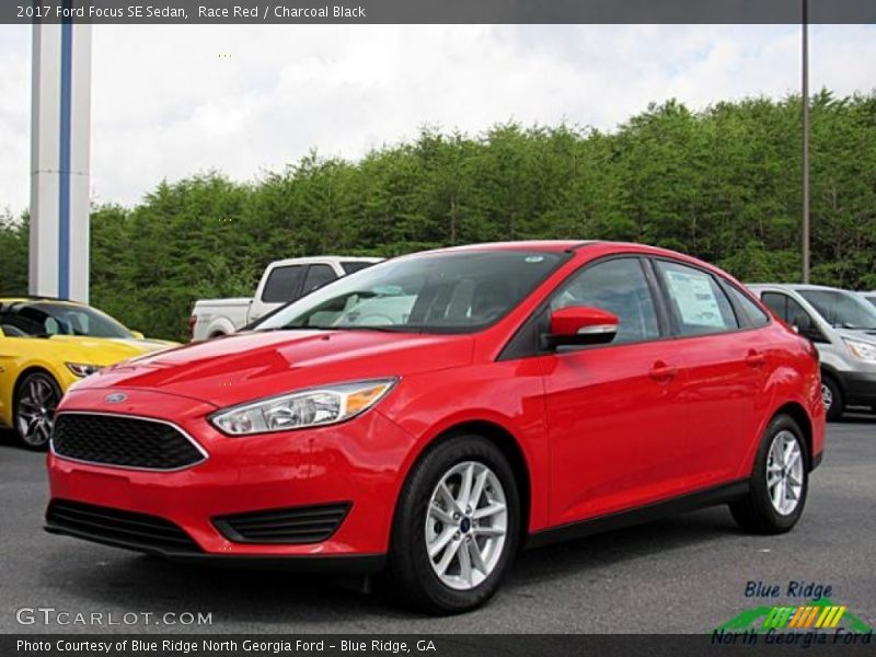 Race Red / Charcoal Black 2017 Ford Focus SE Sedan