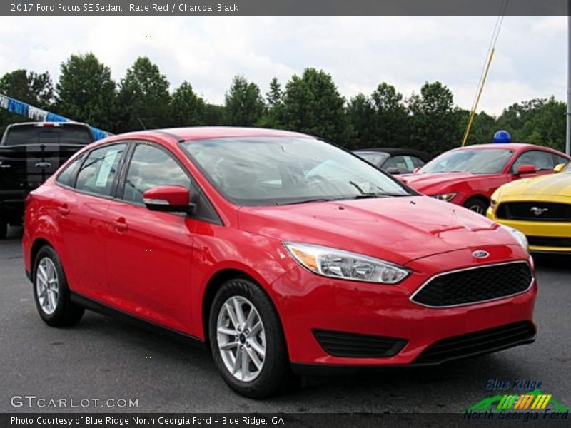 Race Red / Charcoal Black 2017 Ford Focus SE Sedan