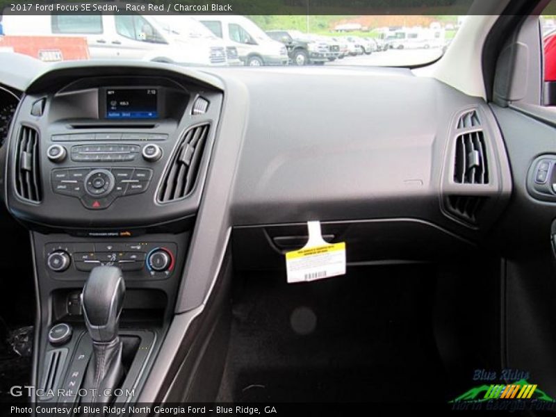 Race Red / Charcoal Black 2017 Ford Focus SE Sedan