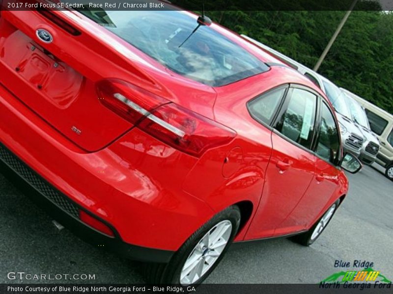 Race Red / Charcoal Black 2017 Ford Focus SE Sedan