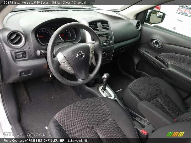 Brilliant Silver / Charcoal 2015 Nissan Versa 1.6 SV Sedan