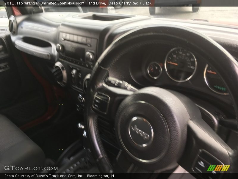 Deep Cherry Red / Black 2011 Jeep Wrangler Unlimited Sport 4x4 Right Hand Drive