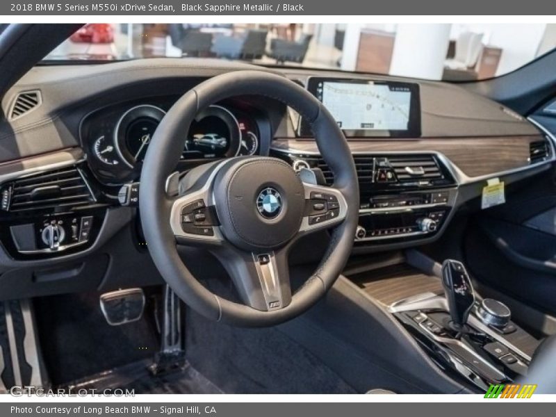 Black Sapphire Metallic / Black 2018 BMW 5 Series M550i xDrive Sedan