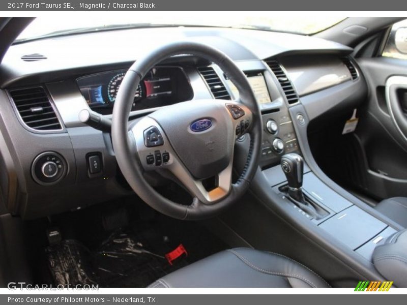 Magnetic / Charcoal Black 2017 Ford Taurus SEL