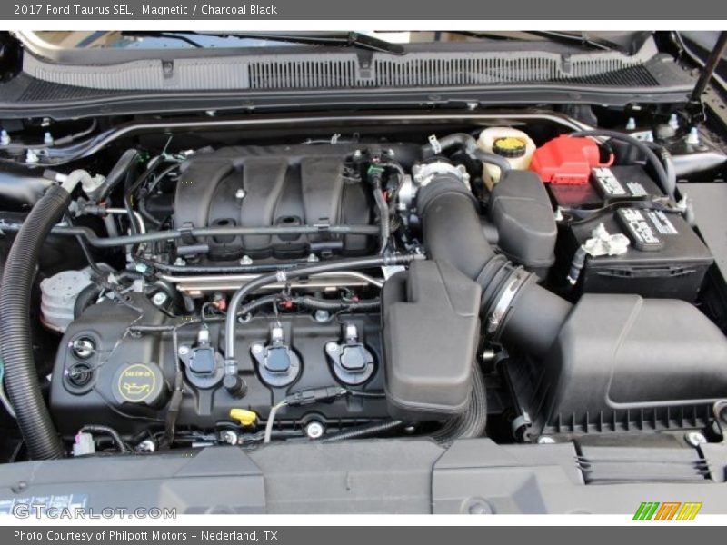 Magnetic / Charcoal Black 2017 Ford Taurus SEL