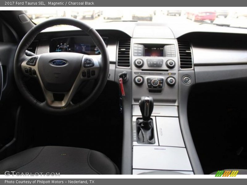 Magnetic / Charcoal Black 2017 Ford Taurus SEL