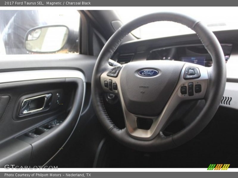 Magnetic / Charcoal Black 2017 Ford Taurus SEL
