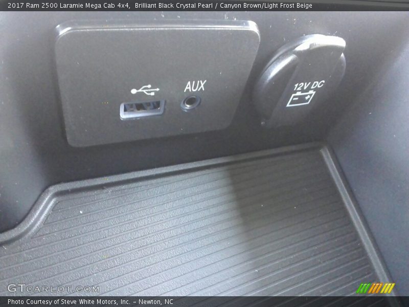 Brilliant Black Crystal Pearl / Canyon Brown/Light Frost Beige 2017 Ram 2500 Laramie Mega Cab 4x4
