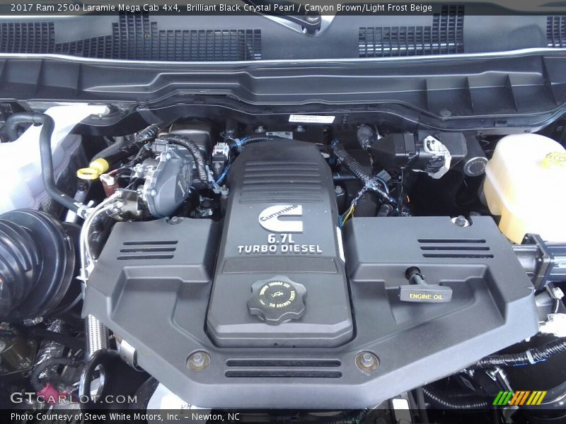 Brilliant Black Crystal Pearl / Canyon Brown/Light Frost Beige 2017 Ram 2500 Laramie Mega Cab 4x4