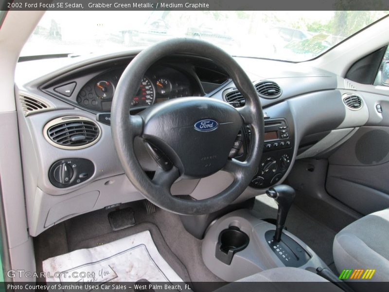 Grabber Green Metallic / Medium Graphite 2002 Ford Focus SE Sedan