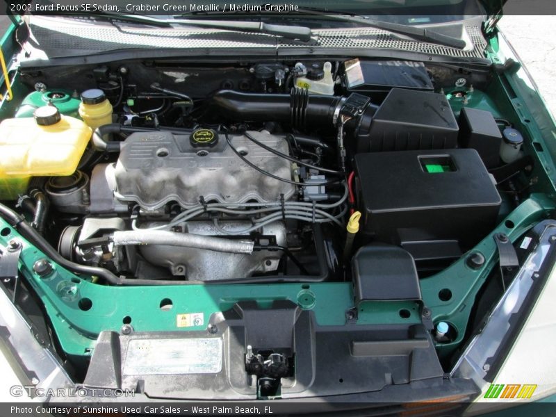Grabber Green Metallic / Medium Graphite 2002 Ford Focus SE Sedan