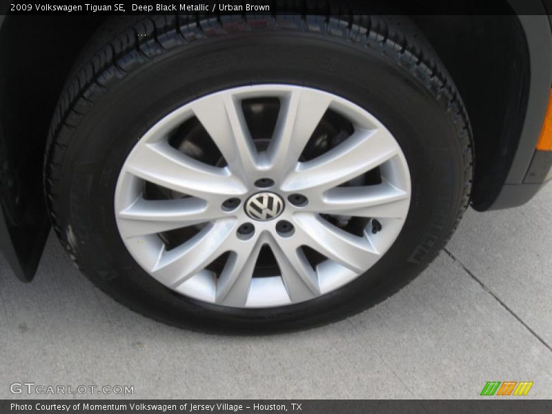 Deep Black Metallic / Urban Brown 2009 Volkswagen Tiguan SE
