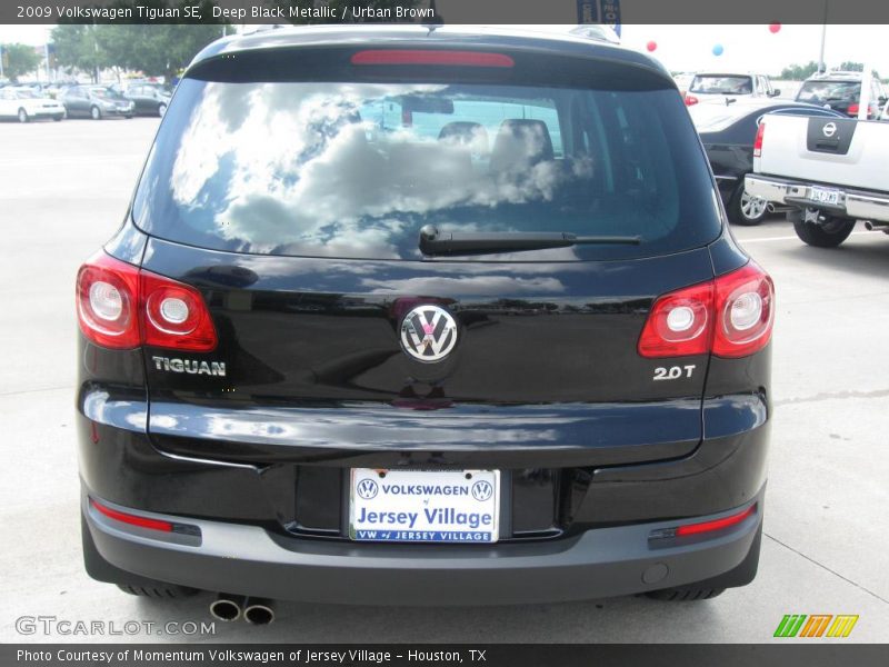 Deep Black Metallic / Urban Brown 2009 Volkswagen Tiguan SE