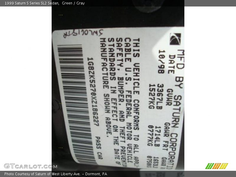 Green / Gray 1999 Saturn S Series SL2 Sedan
