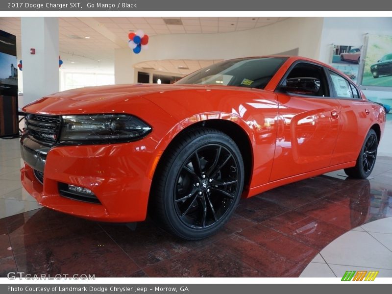 Go Mango / Black 2017 Dodge Charger SXT