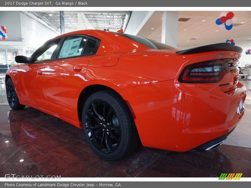 Go Mango / Black 2017 Dodge Charger SXT