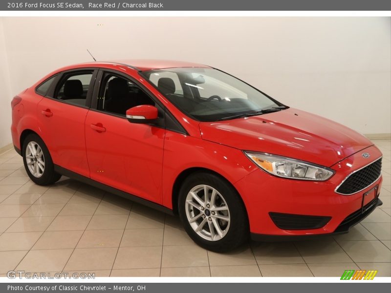 Race Red / Charcoal Black 2016 Ford Focus SE Sedan