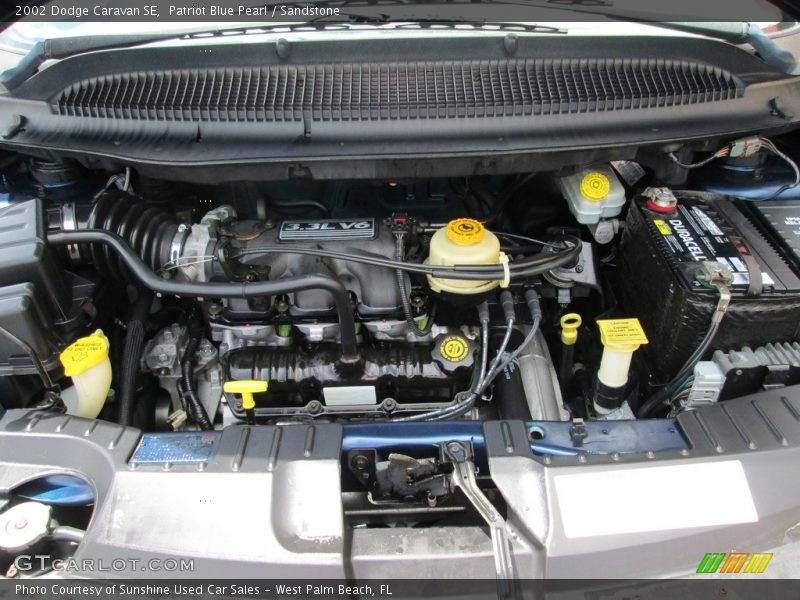 Patriot Blue Pearl / Sandstone 2002 Dodge Caravan SE