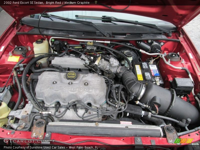 Bright Red / Medium Graphite 2002 Ford Escort SE Sedan