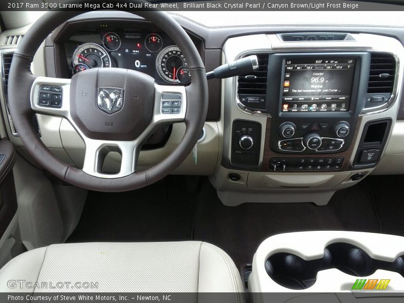 Brilliant Black Crystal Pearl / Canyon Brown/Light Frost Beige 2017 Ram 3500 Laramie Mega Cab 4x4 Dual Rear Wheel