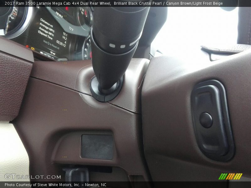 Brilliant Black Crystal Pearl / Canyon Brown/Light Frost Beige 2017 Ram 3500 Laramie Mega Cab 4x4 Dual Rear Wheel