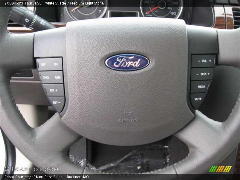 White Suede / Medium Light Stone 2009 Ford Taurus SE