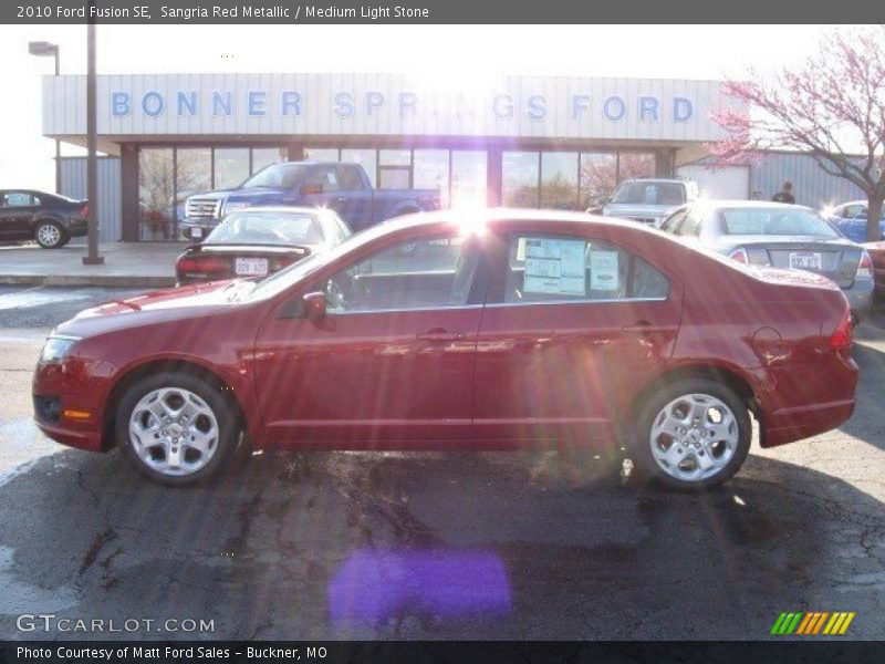 Sangria Red Metallic / Medium Light Stone 2010 Ford Fusion SE