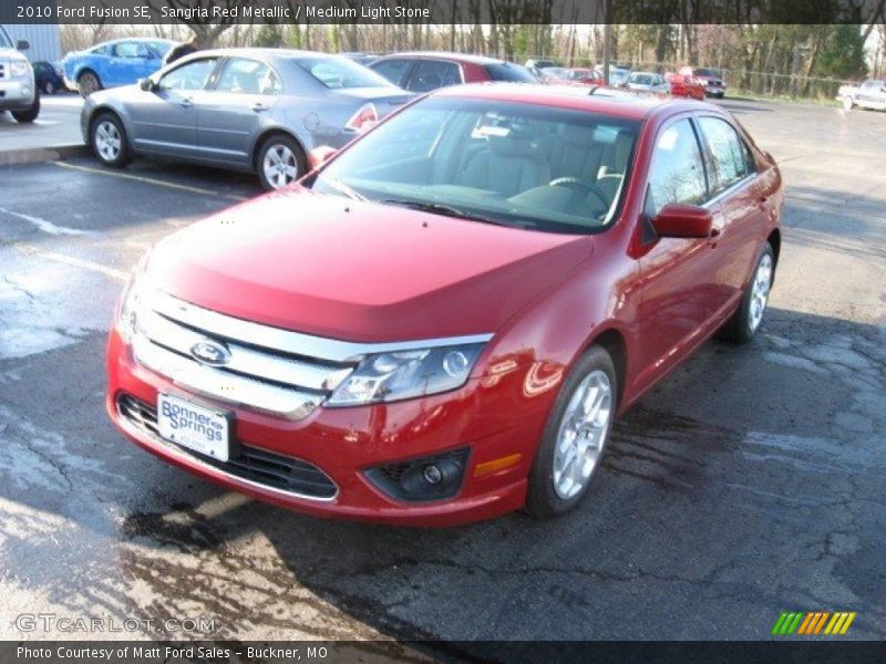 Sangria Red Metallic / Medium Light Stone 2010 Ford Fusion SE