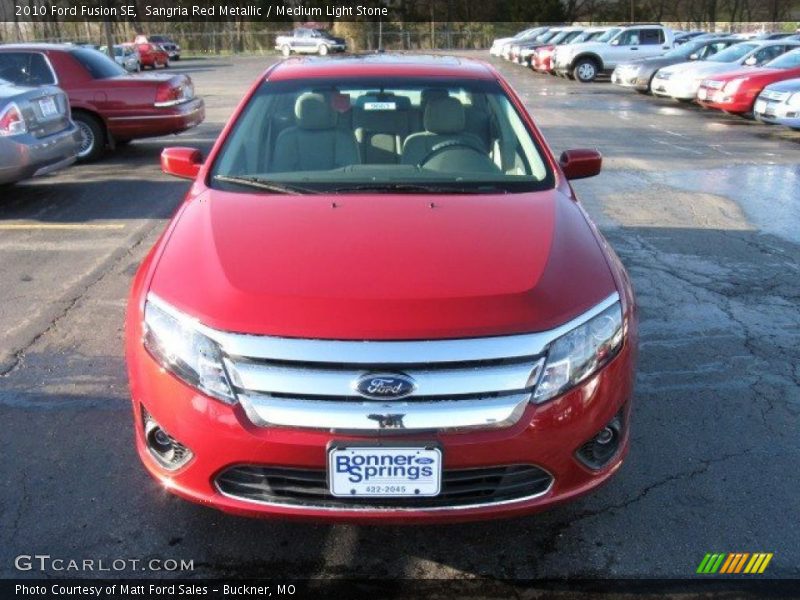 Sangria Red Metallic / Medium Light Stone 2010 Ford Fusion SE