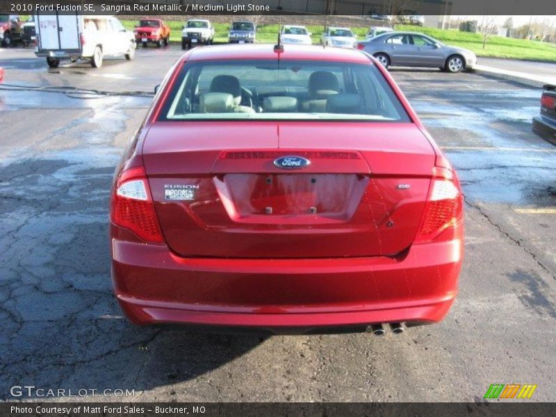 Sangria Red Metallic / Medium Light Stone 2010 Ford Fusion SE