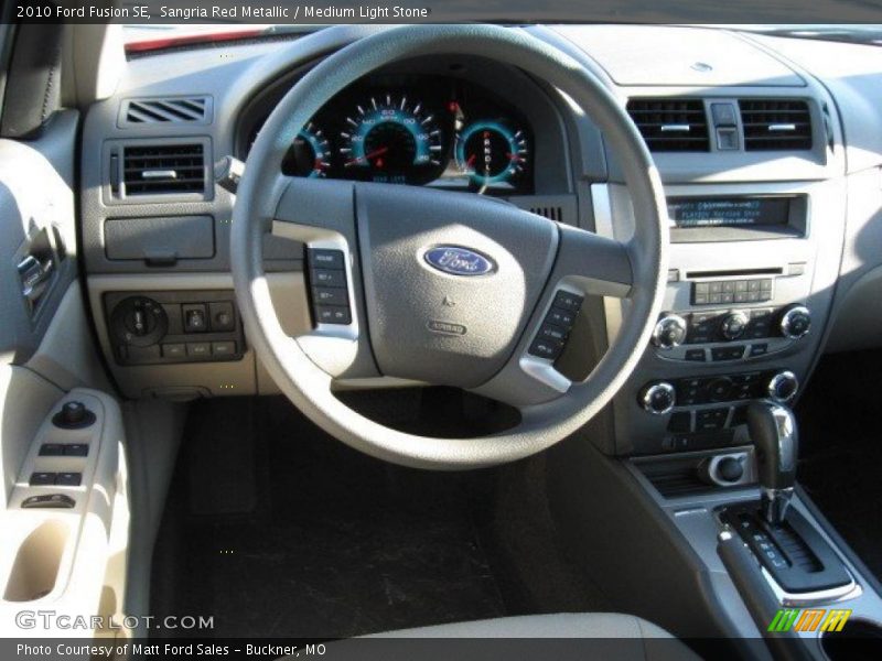 Sangria Red Metallic / Medium Light Stone 2010 Ford Fusion SE